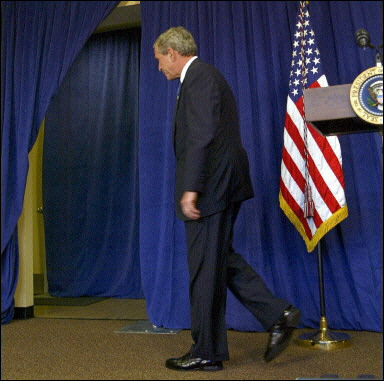 bush walks out on reporters